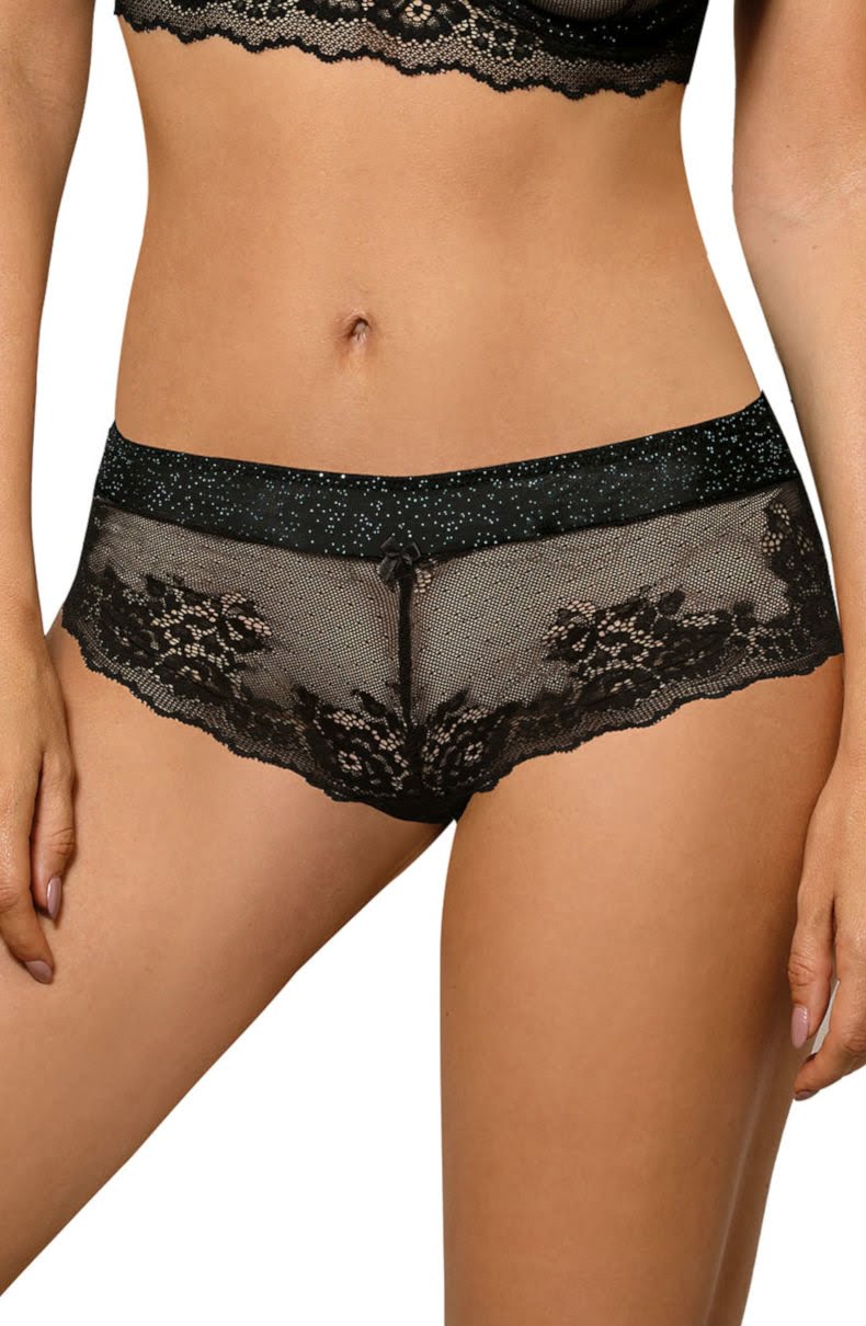 A close-up of a person wearing the Roza Kena Black Brief from Roza. The black lace briefs feature intricate floral patterns, with a waistband that has a subtle shimmer. The delicate floral lace material exudes elegance and delicacy, focusing on the hips and lower torso, echoing the allure of flaunty bralettes or seductive thongs.