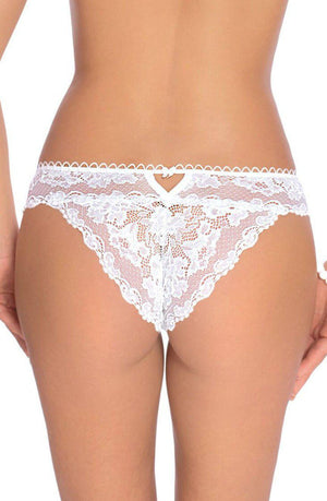 A person is shown from the back, wearing Roza Madam White briefs. The lace features a floral pattern and scalloped edges, accentuated by a small heart-shaped cutout at the waistband. The person's hands are relaxed at their sides, highlighting the exquisite details typical of Roza products.