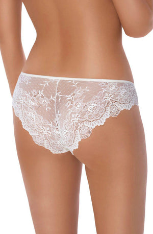 A person shown from the back is wearing Roza Mela Brief Cream with white floral lace underwear. The image focuses on the lower back and undergarment, highlighting the luxurious elastic waistband and intricate lace detailing. The background remains plain and neutral.