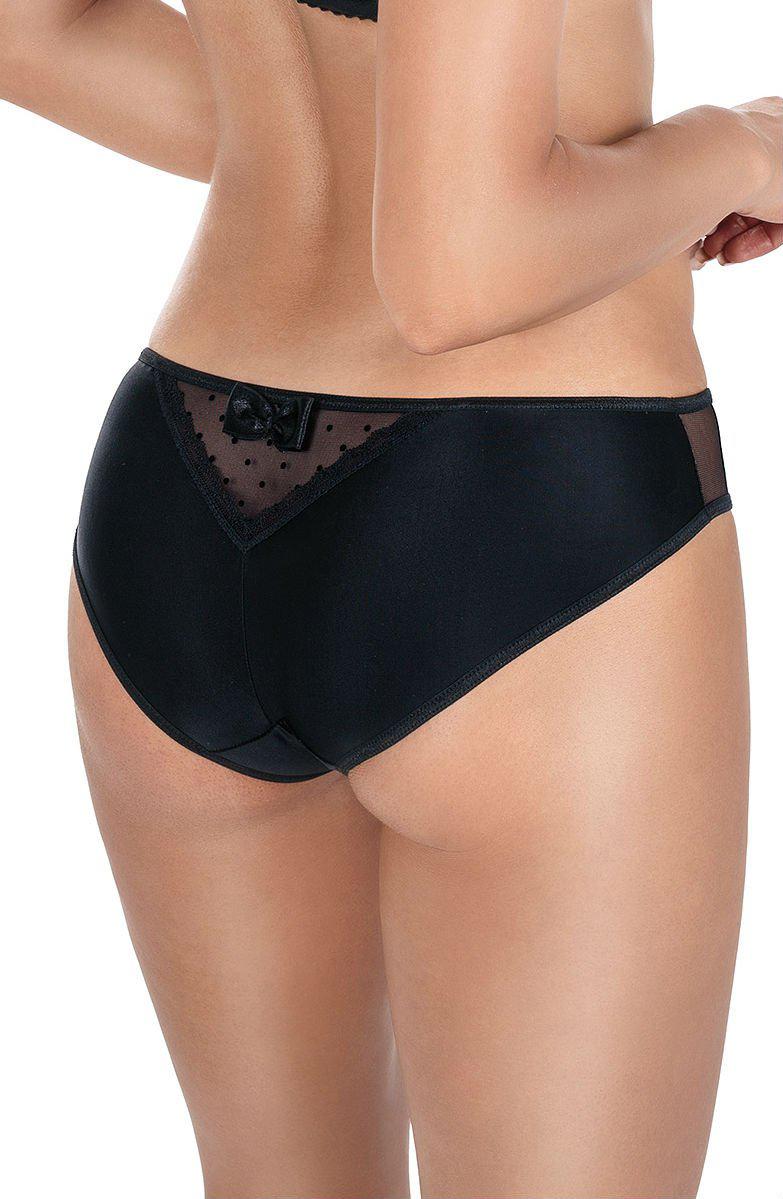 A model showcases the Roza Nefer Brief in Black-Salmon, featuring mesh and velvet polka dot detailing on the back along with a small bow at the waistband. The model is displayed from the waist down, highlighting the romantic design and fit of these briefs from Roza.