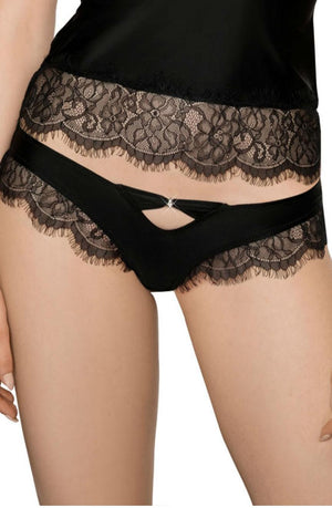 The image features a person wearing the Roza Sija Black Brief, a product by Roza. This elegant lingerie set includes satin briefs with black lace panelling and a small decorative opening in the front, adorned with a tiny gem. The top is also trimmed with black eyelash lace, exuding the essence of luxury lingerie.