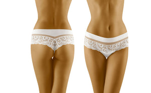 A woman, shown from both front and back views, is wearing the Wolbar Cantata White Thong Shorts by Wolbar. The design features an elegant style with intricate lace detailing around the waist and hip area, blending beautifully with soft microfibre material to showcase the delicate nature of this lingerie.