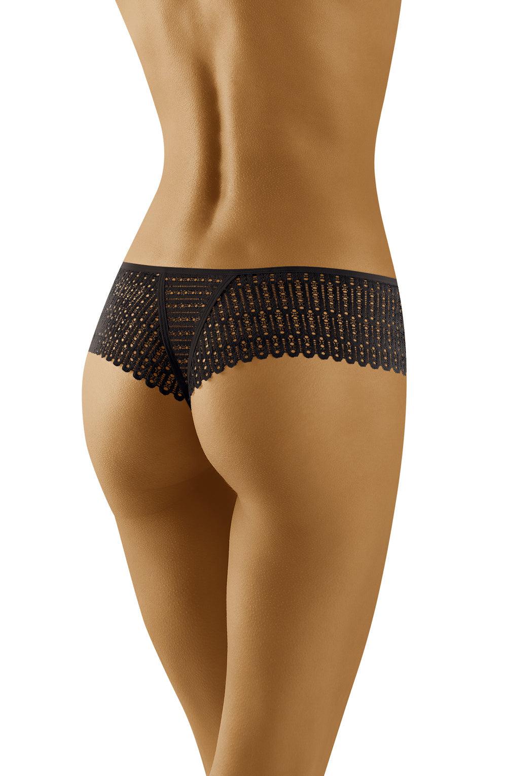 A person is modeling the Wolbar Curanta Black Thong by Wolbar, showcasing their back and lower body. The lingerie gift features intricate lace detailing, highlighting a delicate lace thong. The model stands with their back to the camera.