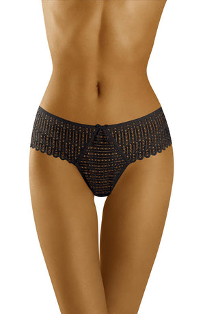 A woman's torso and hips are adorned with the Wolbar Curanta Black Thong, featuring intricate black lace detailing and a small bow at the front. The image captures the design and fit of this Wolbar thong, emphasizing its delicate pattern and texture. This makes it a perfect lingerie gift.