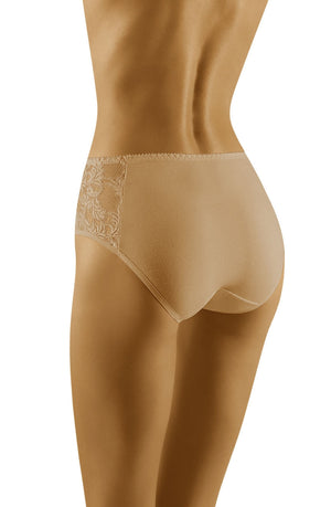 A person wearing Wolbar Eco-Vu Beige Brief is viewed from the back. The photograph showcases the design and fit of the underwear, highlighting its smooth cotton fabric and delicate lace details. The plain white background emphasizes its contours and style.