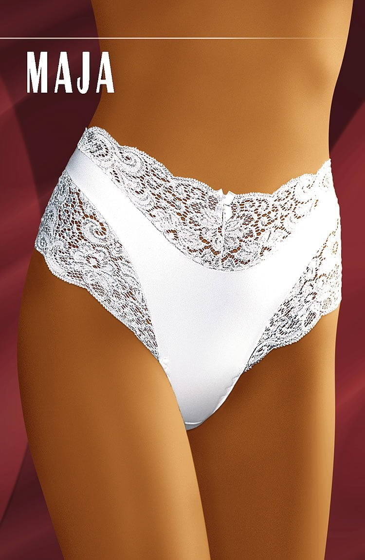 A model wearing the high-waisted Wolbar Maja White Briefs from Wolbar is featured in the image. The panties exhibit intricate lace detailing at the waist and hip areas, highlighting their luxurious fit. The background is a rich burgundy color, with "MAJA" displayed at the top left corner in bold white letters.